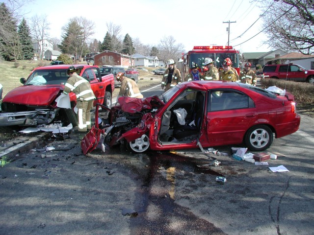 MVA WITH ENTRAPMENT-ASSIST MANOR-3/11/2006