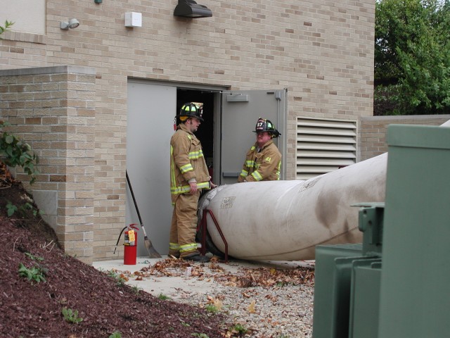 Firefighter Broome and Hays assist vent 112