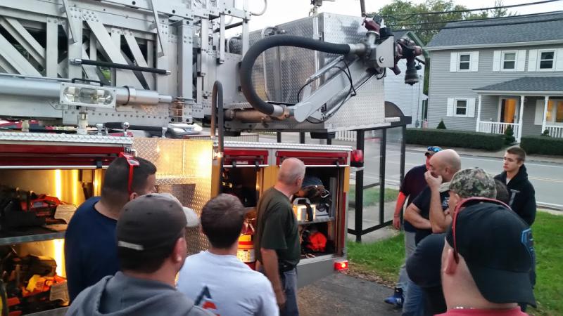 1st Assistant Chief Tom Lamacz giving instruction to WC#3 on the Ladder  