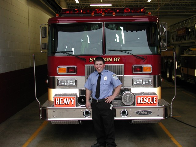 Benny looking sharp in his parade uniform!  What's the white thing hanging from your pocket??